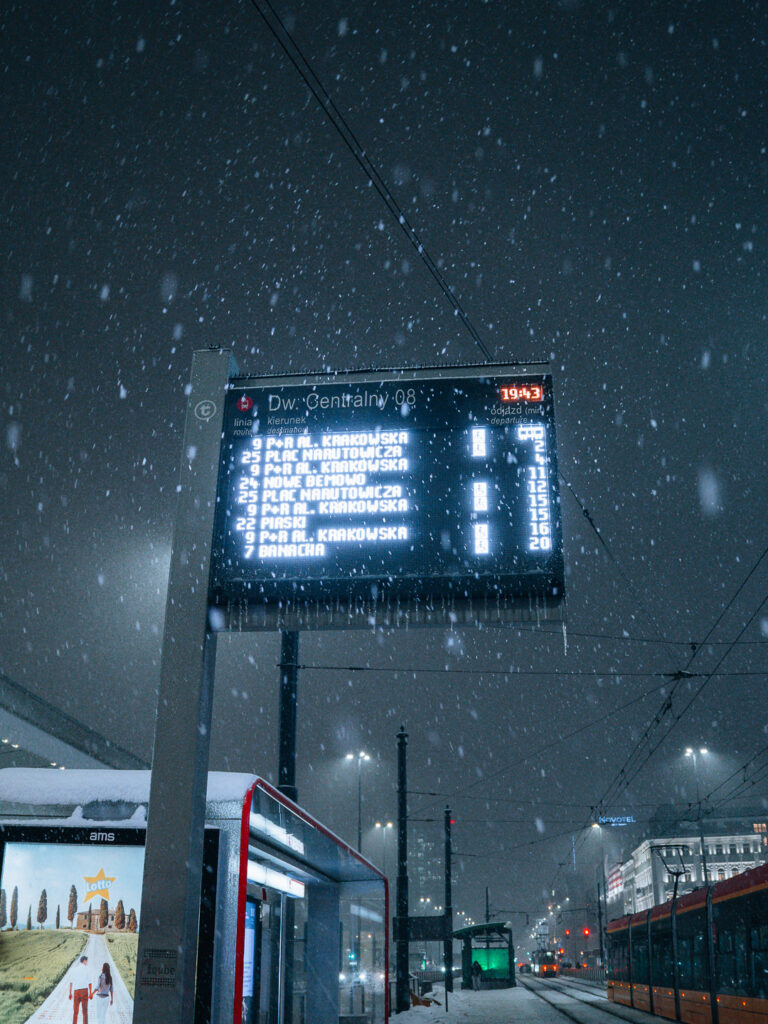 Tram timetable during snowfall in Warsaw.