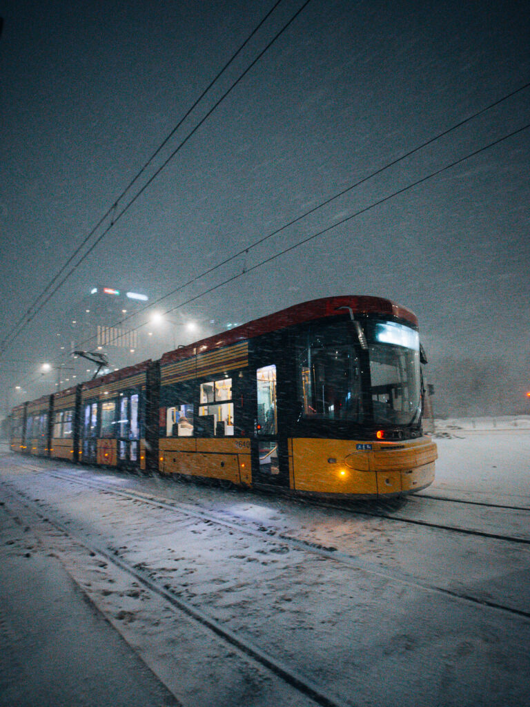 A quick panning shot of a tram in Warsaw during snowstorm. 