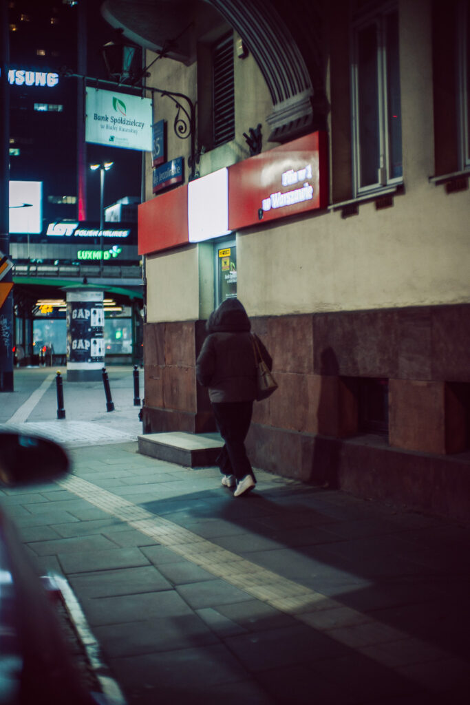 A silhouette photo taken on the street.