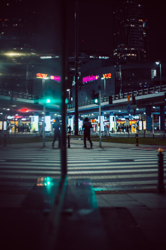 A dark silhouette in a black hoodie. 