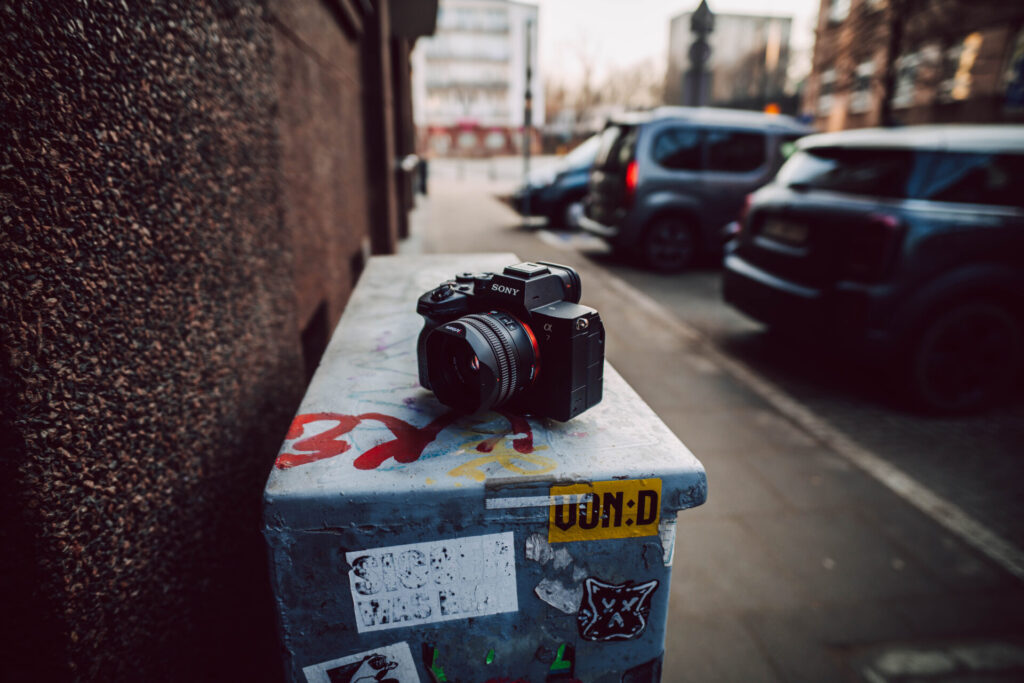 A photo of a 7Artisans 40mm F2.5 lens and Sony A7IV.