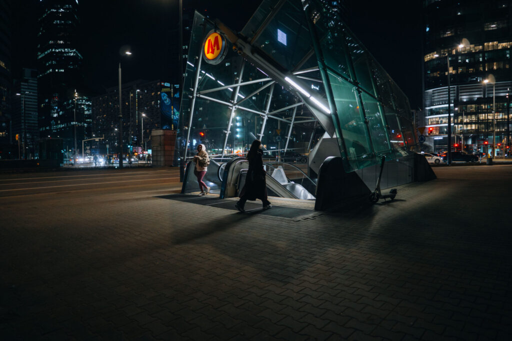 Two silhouettes caught before entering the metro. Taken with Sigma 15mm F1.4 DC.